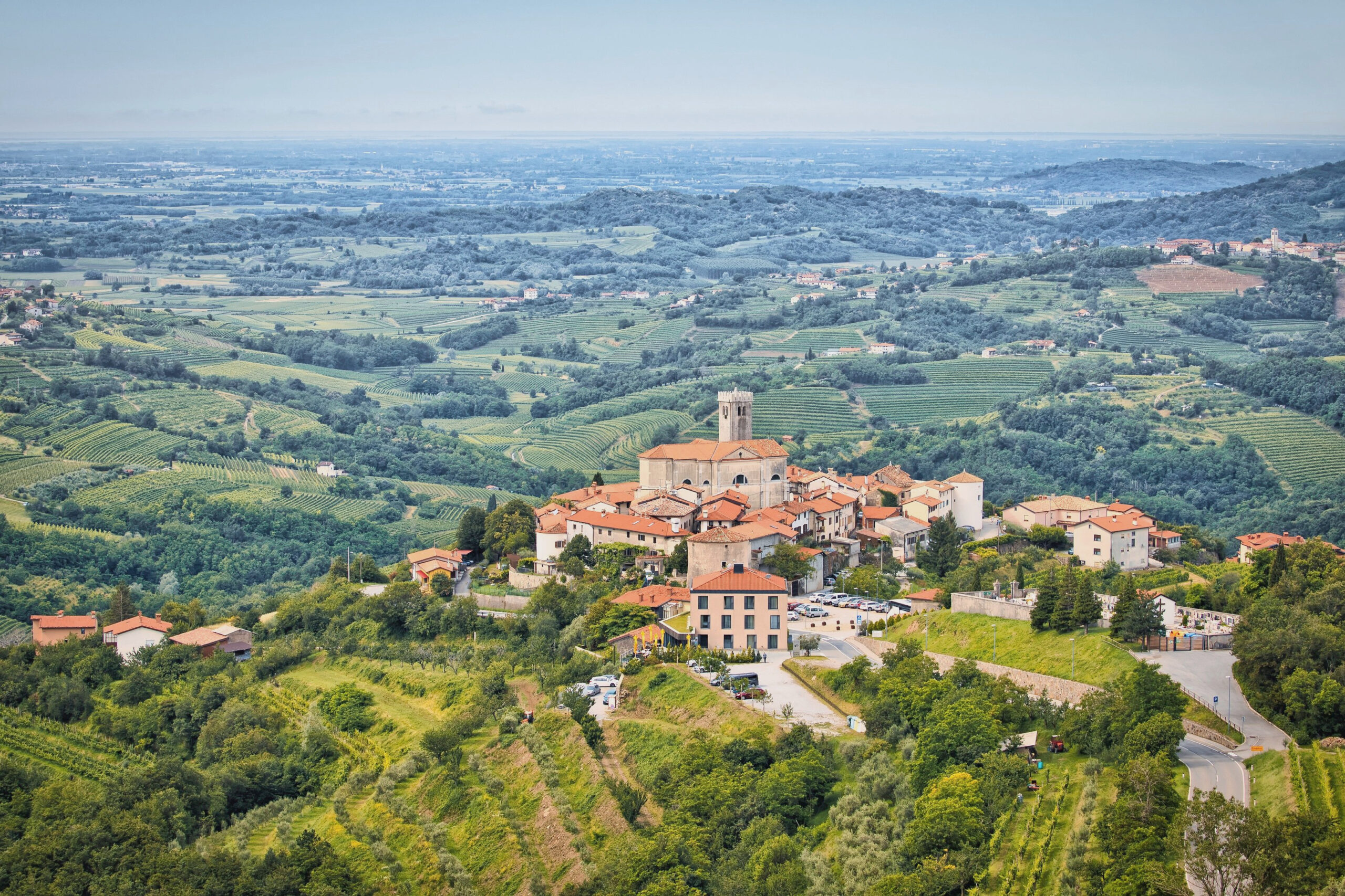 The hilltop village of Šmartno among the vineyards of Goriška Brda.
